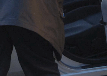 Video: Woman pulls male intruder out of her car, throws him to the ground with ease — while her amazed husband watches