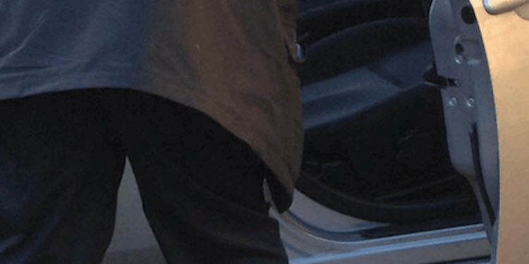 Video: Woman pulls male intruder out of her car, throws him to the ground with ease — while her amazed husband watches