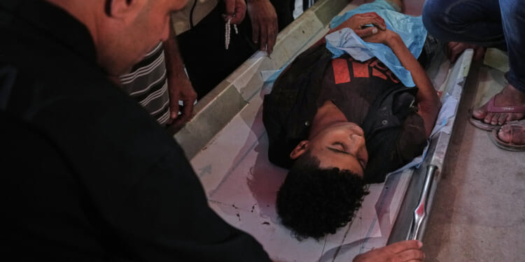 Israel launches attack in Gaza that Hamas says could mean 'collapse' of ceasefire