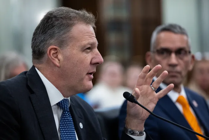 Former New Hampshire governor Chris Sununu, now leading Airlines for America, told senators the shutdown created a “24-hour nonstop logistical nightmare” for airlines as controller shortages tripled staffing-related delays.