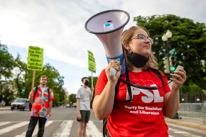 Taylor Young holds a bullhorn during an abortion rights protest led by the Party for Socialism and Liberation in front of the Supreme Court of the United States in Washington on Wednesday, May 11, 2022. (AP Photo/Amanda Andrade-Rhoades)
