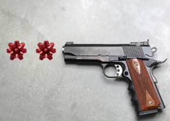 gun shooting christmas bows