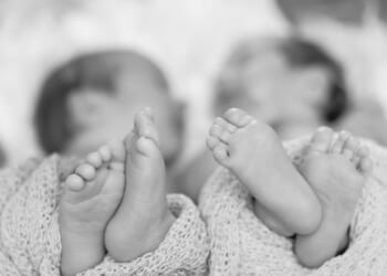 twin babies’ feet