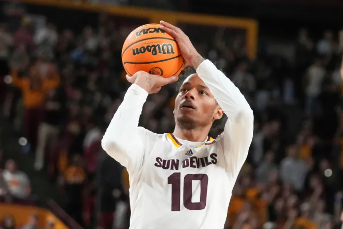 Arizona State guard Chatton "BJ" Freeman (10) shoots during the first half of an NCAA college basketball game.