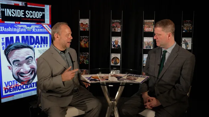 two men sitting at a table