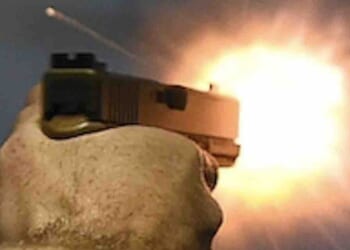 Thug forces his way into apartment, attacks elderly resident. But armed neighbor rushes over and permanently ends threat.