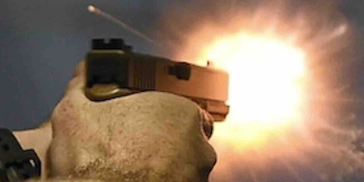 Thug forces his way into apartment, attacks elderly resident. But armed neighbor rushes over and permanently ends threat.