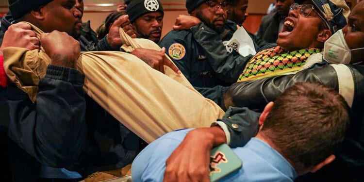 Unruly anti-ICE protesters shut down NOLA city council meeting — police carry out activist