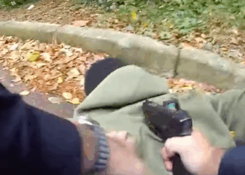 'You done f**ked up, son!' Cop rubs it in after capturing homicide suspect armed with handgun modified as fully automatic
