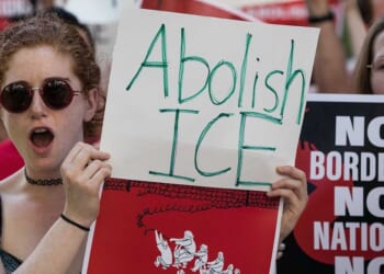 Liberal protesters dump ice into harbor on anniversary of Boston Tea Party to protest deportations