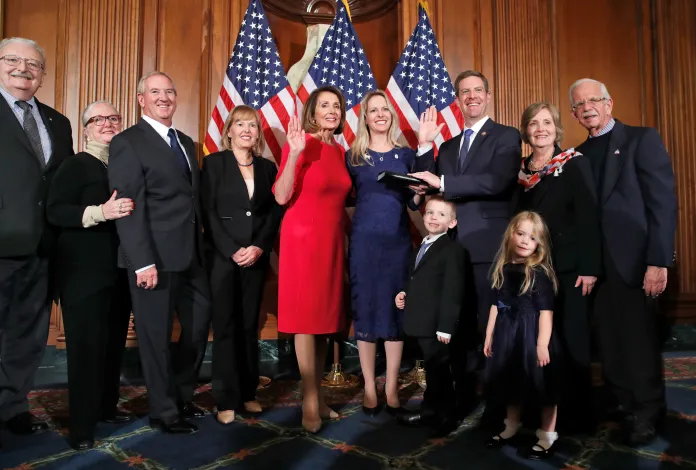 House Speaker Nancy Pelosi (D-CA) poses during a ceremonial swearing-in with Rep. Mike Levin (D-CA).