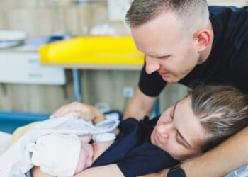 Mom, Dad, and baby after mom gave birth