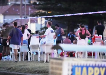 Bystander who disarmed Bondi Beach gunman hailed as hero