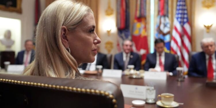 DOJ restores image that includes photo of Trump to Epstein files site