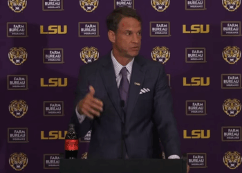 Lane Kiffin speaking at a presser.