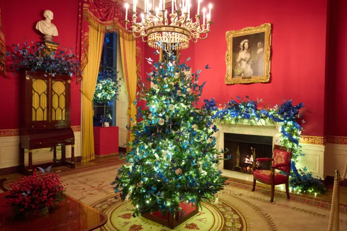 A Christmas tree decorates the Red Room of the White House.