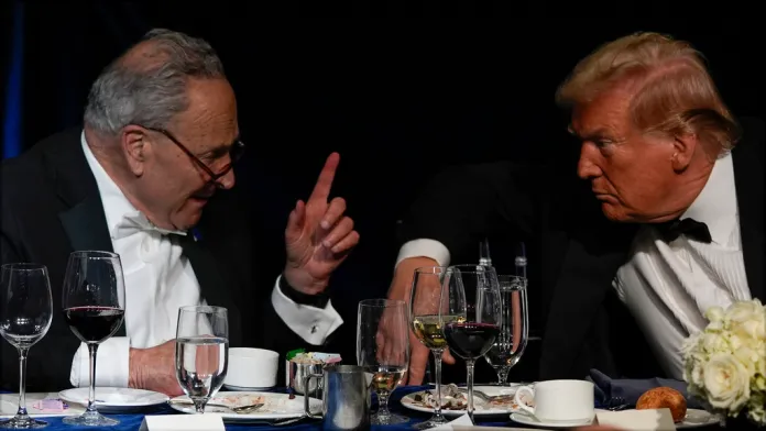 Then-Republican presidential nominee former President Donald Trump talks with then-Senate Majority Leader Chuck Schumer of N.Y., at the 79th annual Alfred E. Smith Memorial Foundation Dinner, Thursday, Oct. 17, 2024, in New York