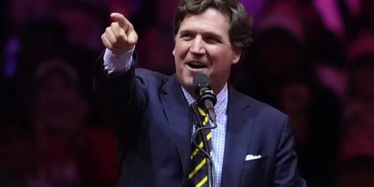 Tucker Carlson speaks at AmericaFest