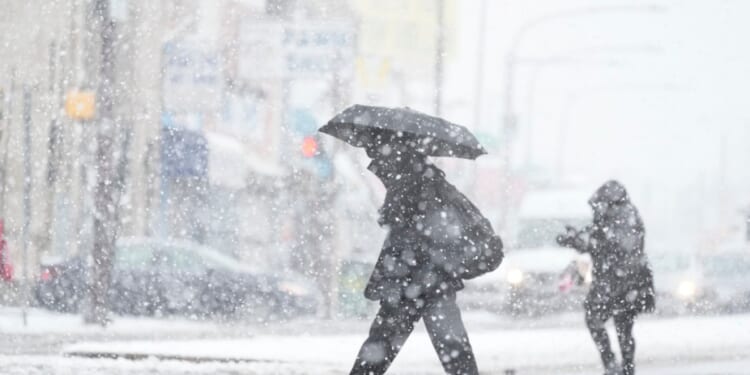 Winter storm snarls holiday travel across Northeast, Great Lakes