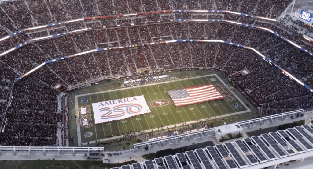 american flag and 250 flag on the feld