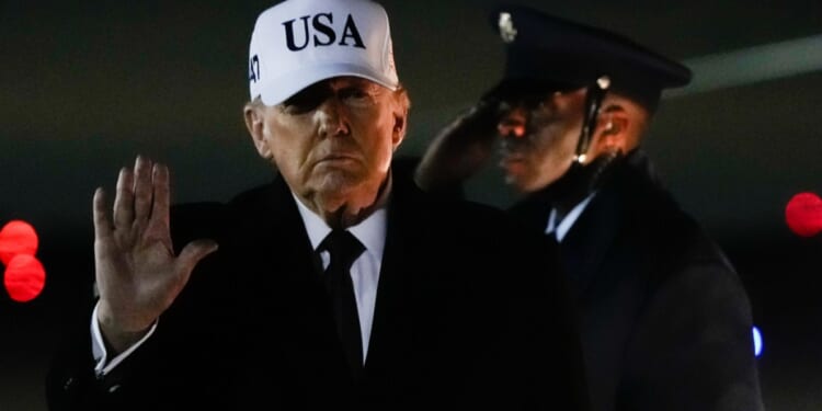 Air Force One turns back after 'minor electrical issue' en route to Davos