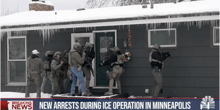 Department of Homeland Security officers surround the home of a suspected criminal illegal alien in Minneapolis.