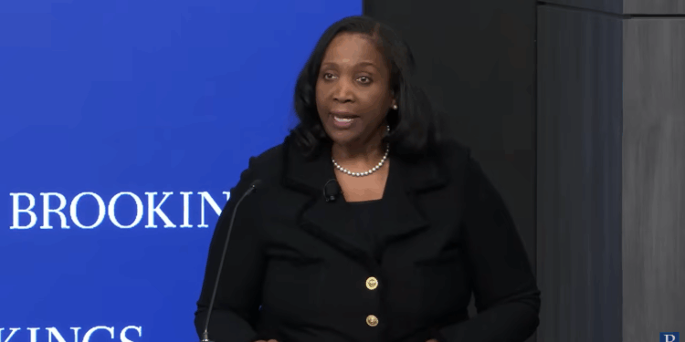 Lisa Cook speaking at an event.