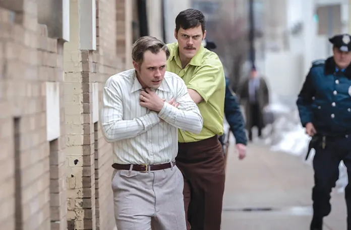 Bill Skarsgard, right, with Dacre Montgomery in Dead Man’s Wire. (Courtesy Row K)