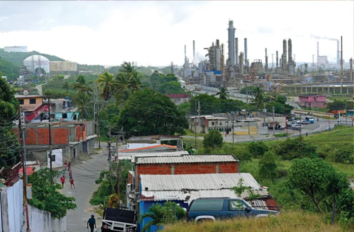 The El Palito refinery rises above Puerto Cabello, Dec. 2025. (Matias Delacroix/AP)