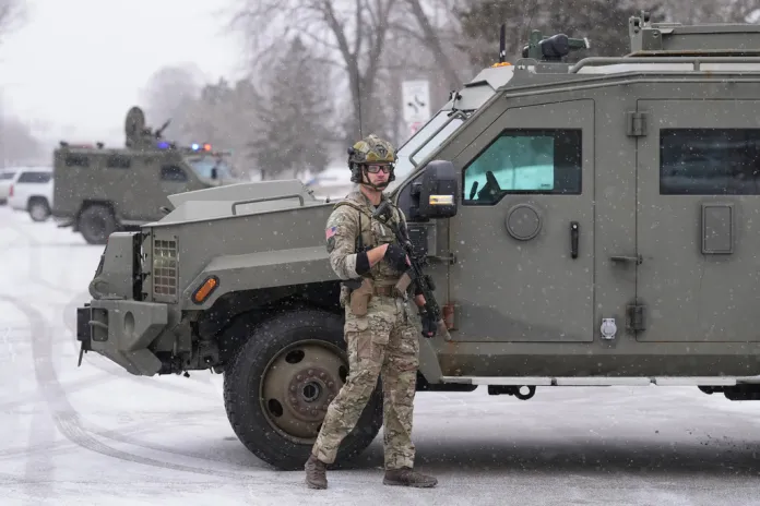 An FBI officer works the scene.