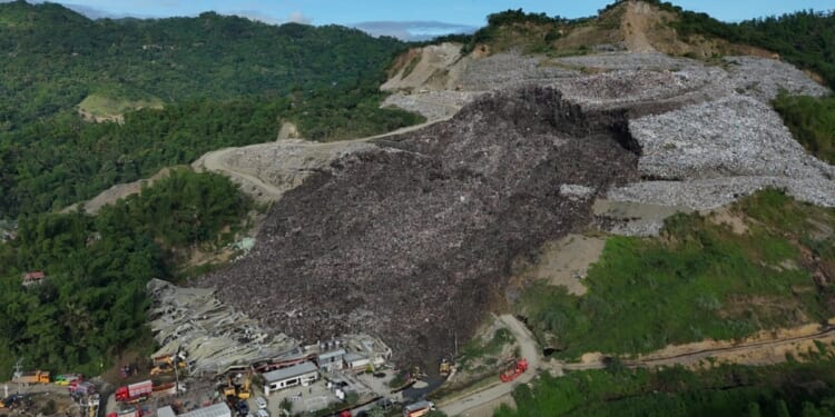 Filipino rescuers detect ‘signs of life’ in garbage avalanche that killed 4 and left dozens missing