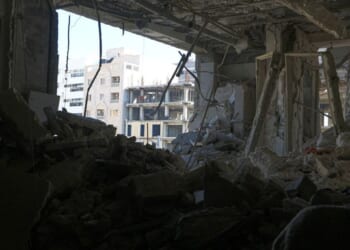 Five dead and dozens injured after two explosions rock Iran