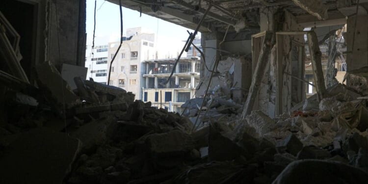 Five dead and dozens injured after two explosions rock Iran