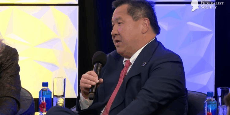 James Ho speaking at a lecture.