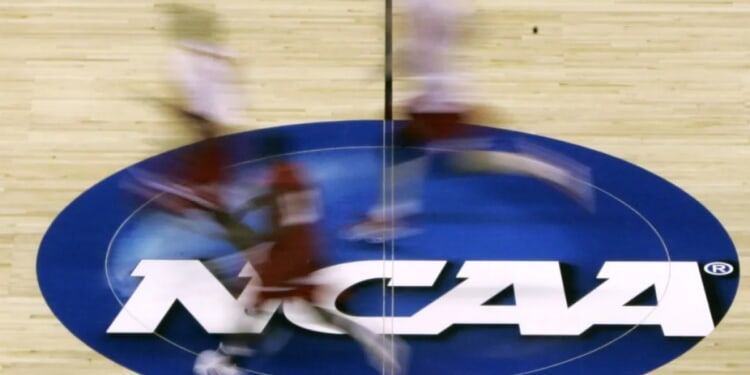 Over two dozen charged in 'massive scheme' to rig college basketball games
