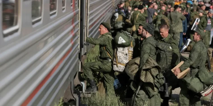 Russia offers cash bonuses, frees prisoners and lures foreigners to replenish its troops in Ukraine