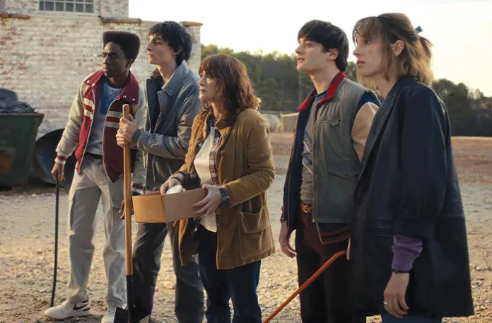 Caleb McLaughlin as Lucas Sinclair, Finn Wolfhard as Mike Wheeler, Winona Ryder as Joyce Byers, Noah Schnapp as Will Byers and Maya Hawke as Robin Buckley in Season 5 of Stranger Things. (Courtesy of Netflix)