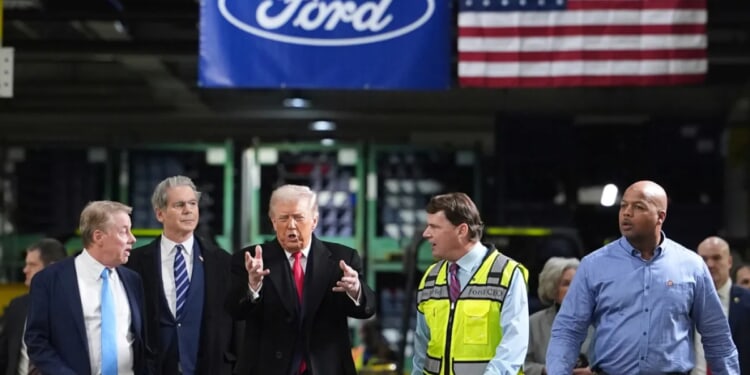 Trump flips off Ford factory worker who yelled 'pedophile protector'