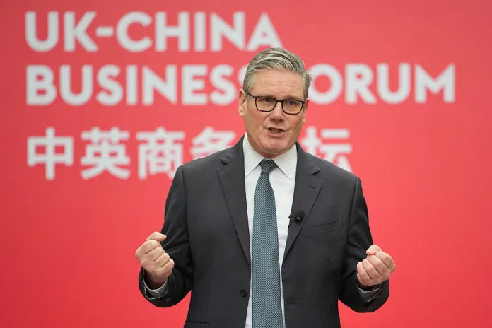 Britain's Prime Minister Keir Starmer delivers remarks during the UK-China Business Forum at the Bank of China in Beijing on January 30, 2026. Britain's Prime Minister Keir Starmer's visit to China is the first by a British premier since 2018 and follows a slew of Western leaders seeking a rapprochement with Beijing recently, pivoting from an increasingly unpredictable United States. (Photo by Kin Cheung / POOL / AFP via Getty Images)