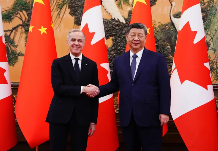 Canada's Prime Minister Mark Carney, left, meets with Chinese President Xi Jinping at the Great Hall of the People in Beijing Friday, Jan. 16, 2026.