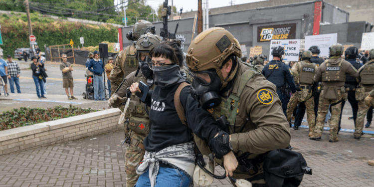 ICE agents detaining individual