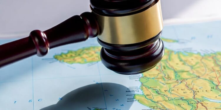 First Gay Immigrant Judge Claims Trump Can't Deport Haitian Illegals Because It's Racist