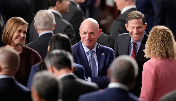 Sen. Elissa Slotkin, D-Mich., left, Sen. Mark Kelly, D-Ariz., center, and Sen. Richard Blumenthal, D-Conn., right, are seen before President Donald Trump delivers the State of the Union address to a joint session of Congress in the House chamber at the U.S. Capitol in Washington, Tuesday, Feb. 24, 2026. (AP Photo/Alex Brandon)