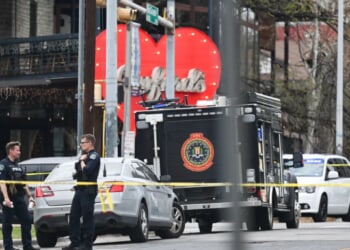 Texas bar shooting suspect wore 'Property of Allah' clothing with Iranian flag