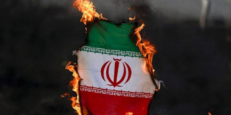 Canadian Cops Arrest Man for Burning Iranian Flag