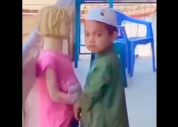 Someone Please Save the Mannequin From this Little Muslim Boy!