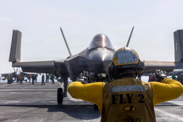 This image provided by U.S. Central Command shows a F-35C Lightning preparing to launch from the USS Abraham Lincoln (CVN 72) in support of Operation Epic Fury, on Saturday, Feb. 28, 2026.