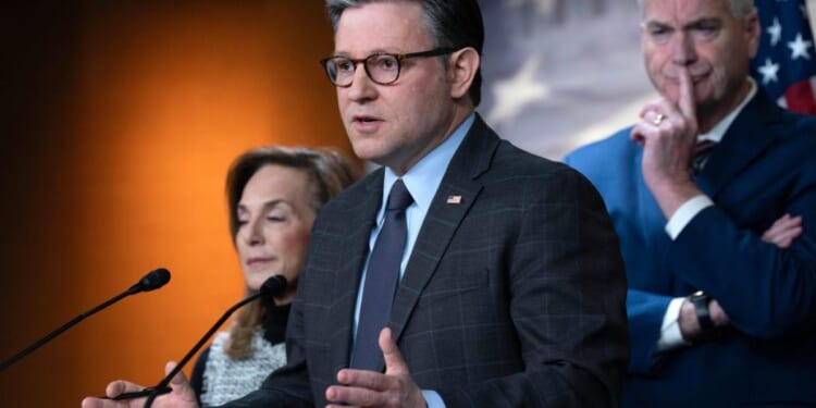 GOP rebels force Johnson to delay vote on government spy powers