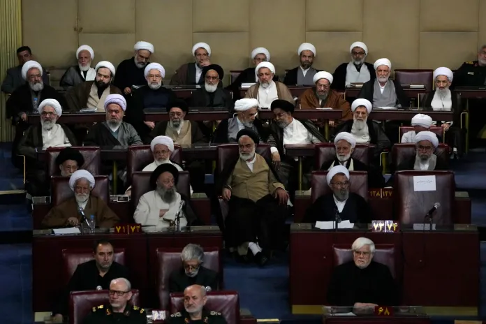 Members of the Assembly of Experts argue in a forum