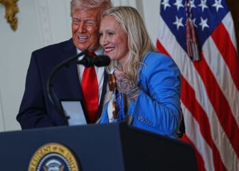 Olympic bobsledder awards Trump her 'Order of Ikkos' medal